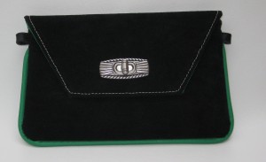 This was the first  prototype/re-work of my wristlet pattern.  I liked the contrast of the green with sharp black suede and white stitching (they were too crooked for me though!)